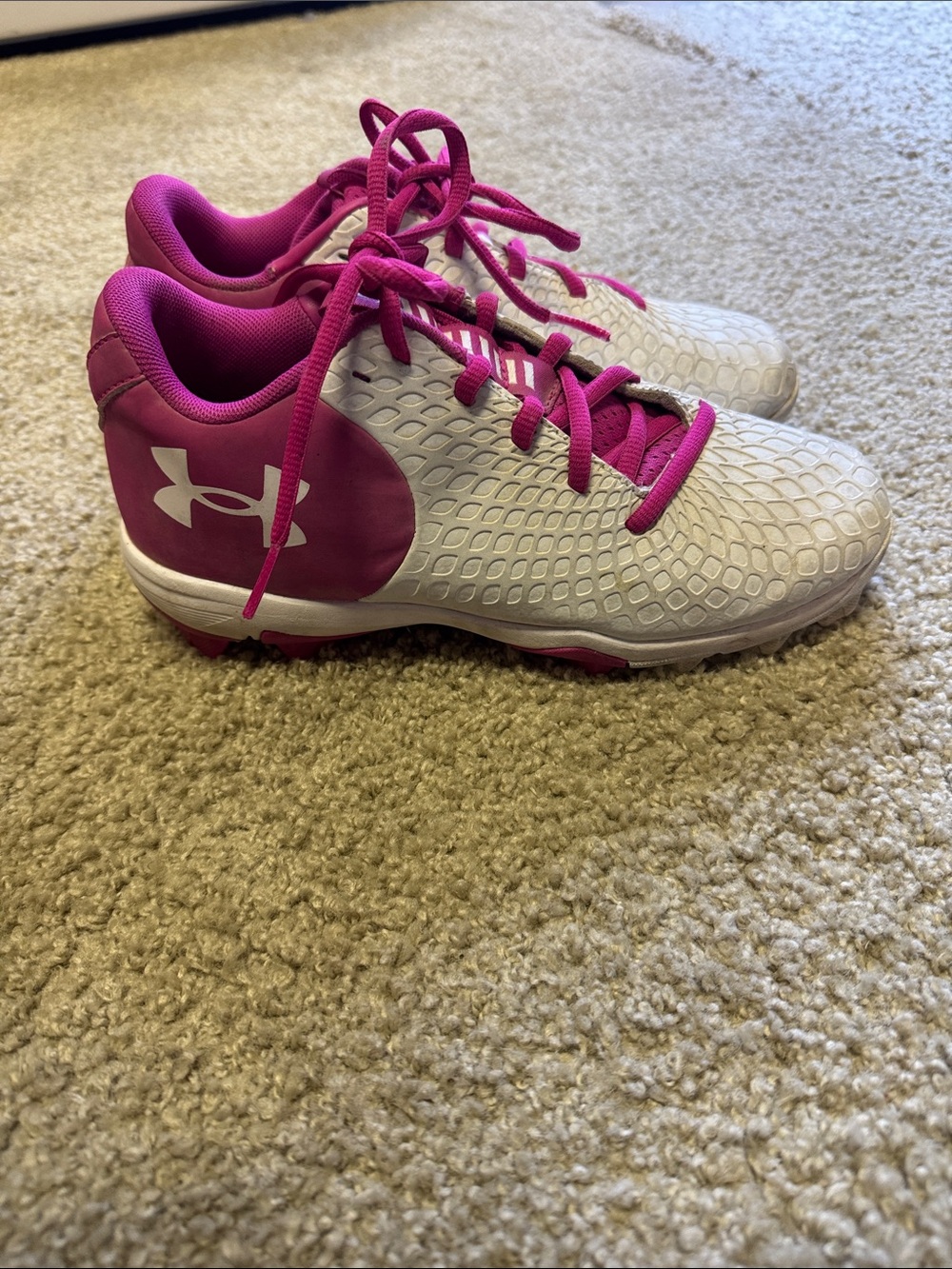 Under Armour White and Fuchsia Kids' Athletic Cleats